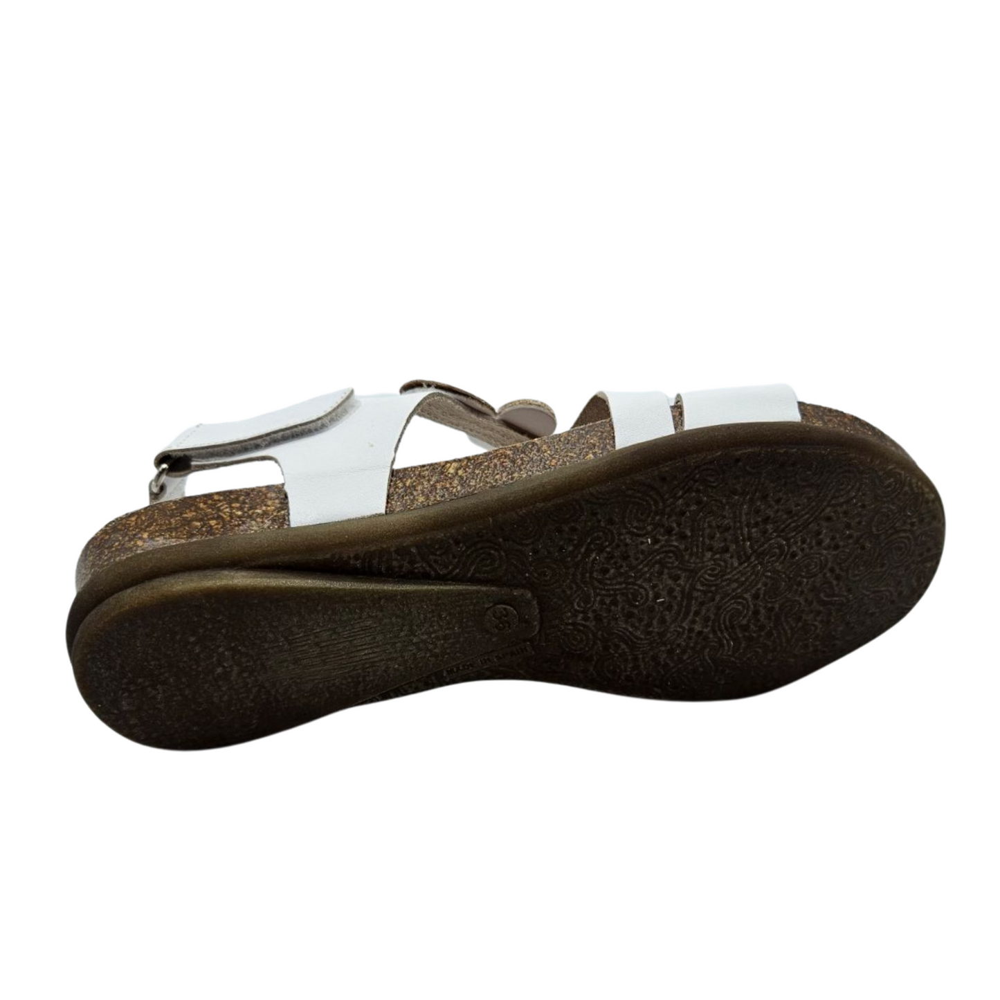 Bottom view white leather sandal with mixed metallic accents on upper strap. It has a velcro ankle strap and rounded toe.