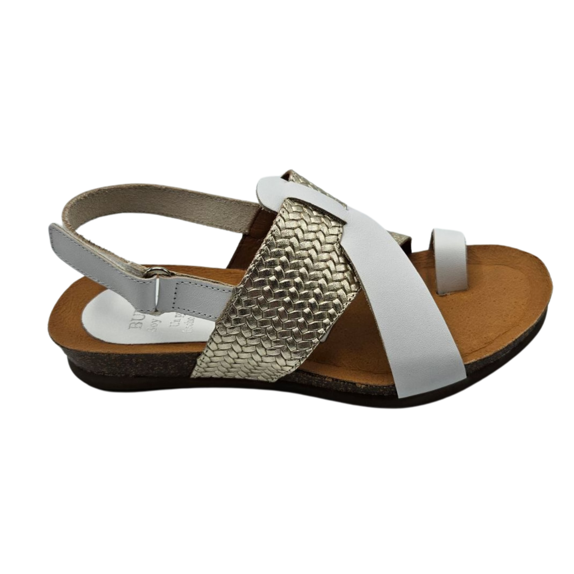 Right facing view of white and gold leather sandal with a toe strap and velcro ankle strap. Braided detail on the gold strap and cushioned footbed