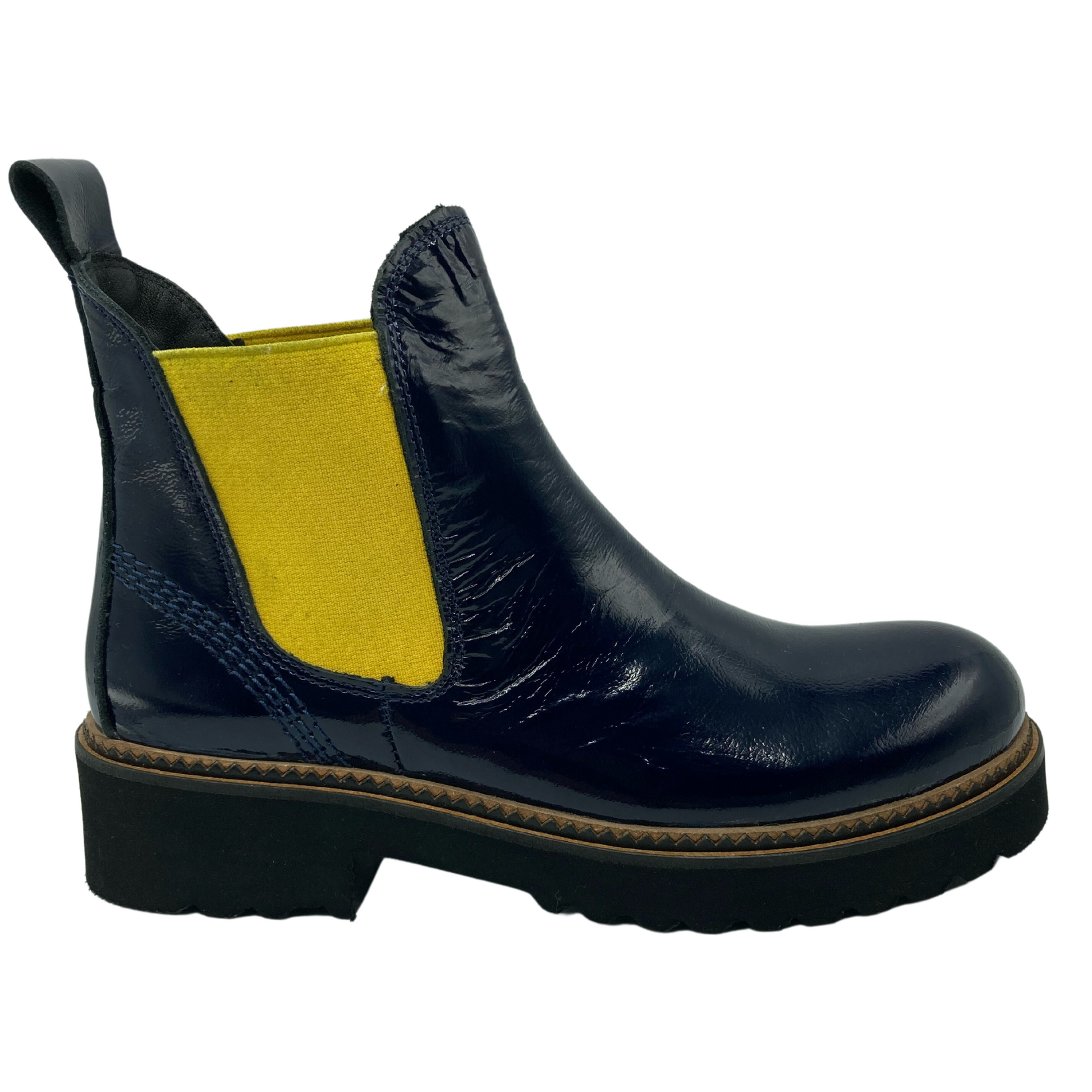 Right facing view of navy patent leather ankle boot with yellow elastic side gore and black lug sole