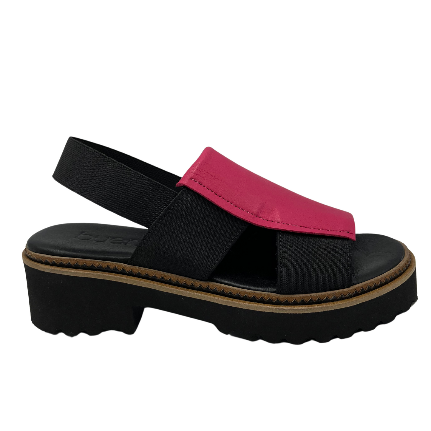 Right facing view of hot pink sandal with chunky sole and black elastic straps