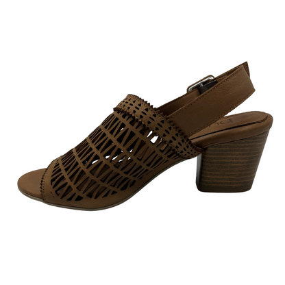 Left facing view of brown leather sandal with block heel and cutout details