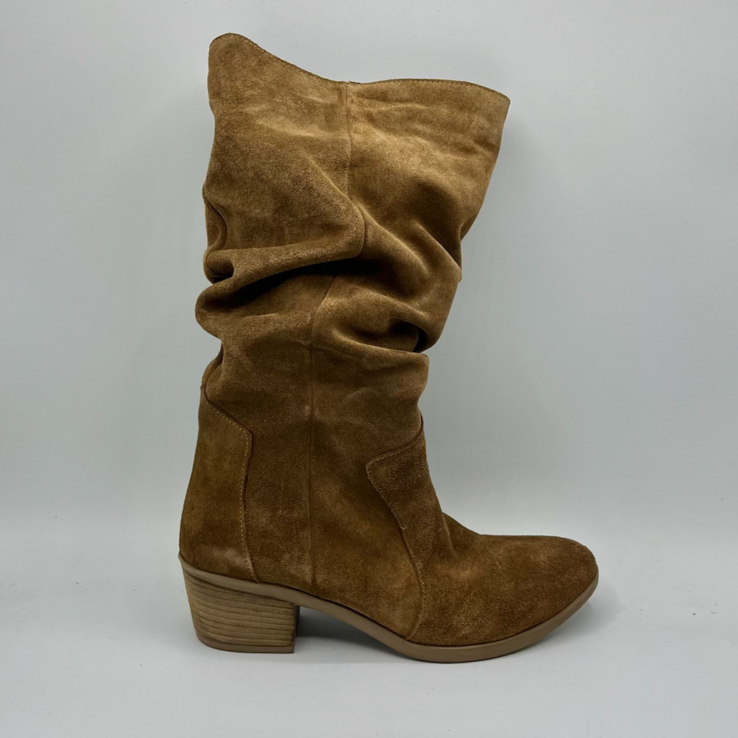 Brown suede knee-high boot on a light gray background