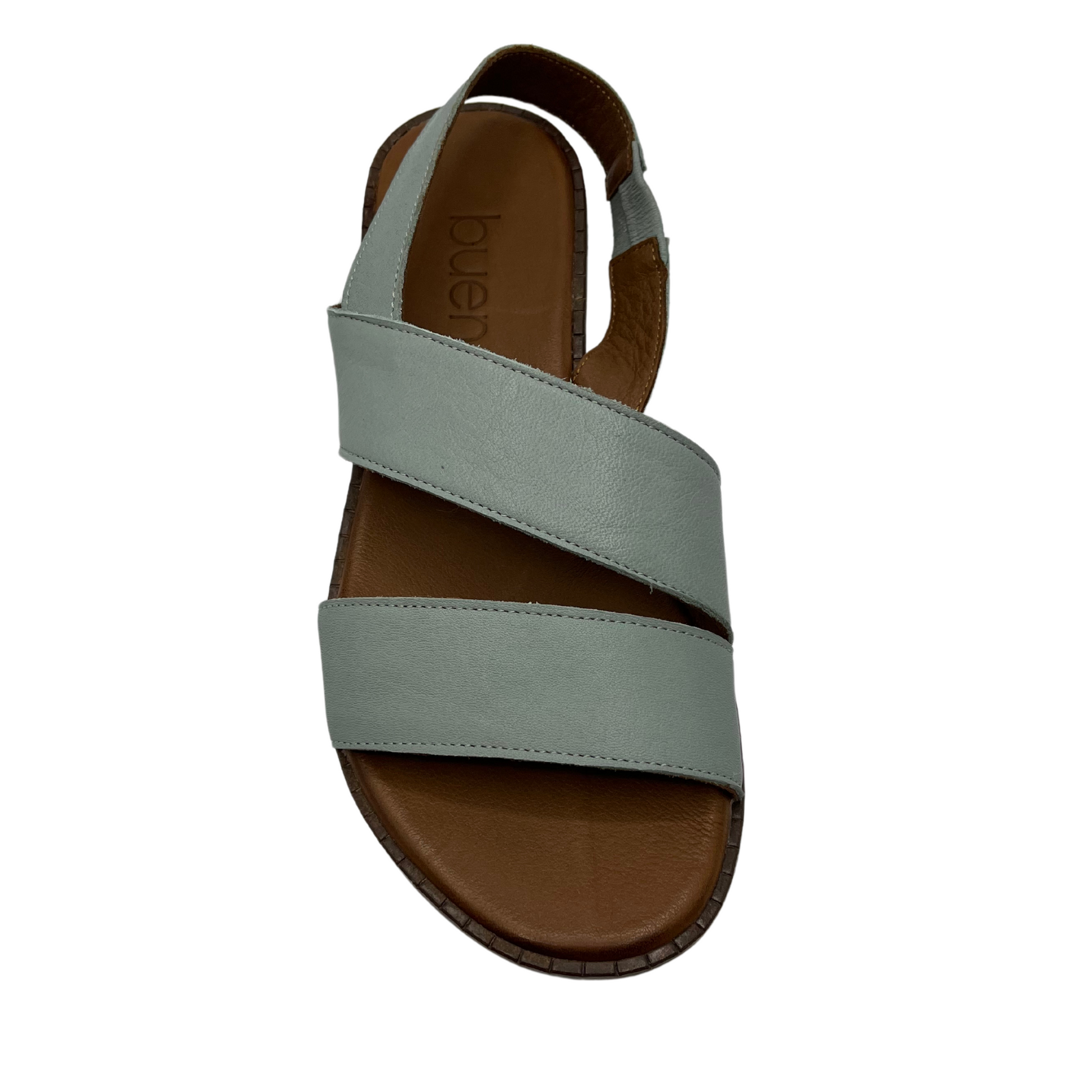 Top view of pale green leather sandal with slight wedge heel, rounded tow and slingback strap