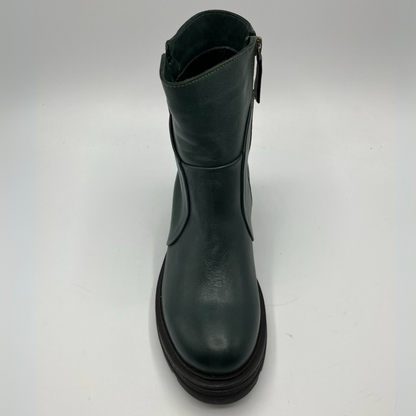 Green leather boot on a white background