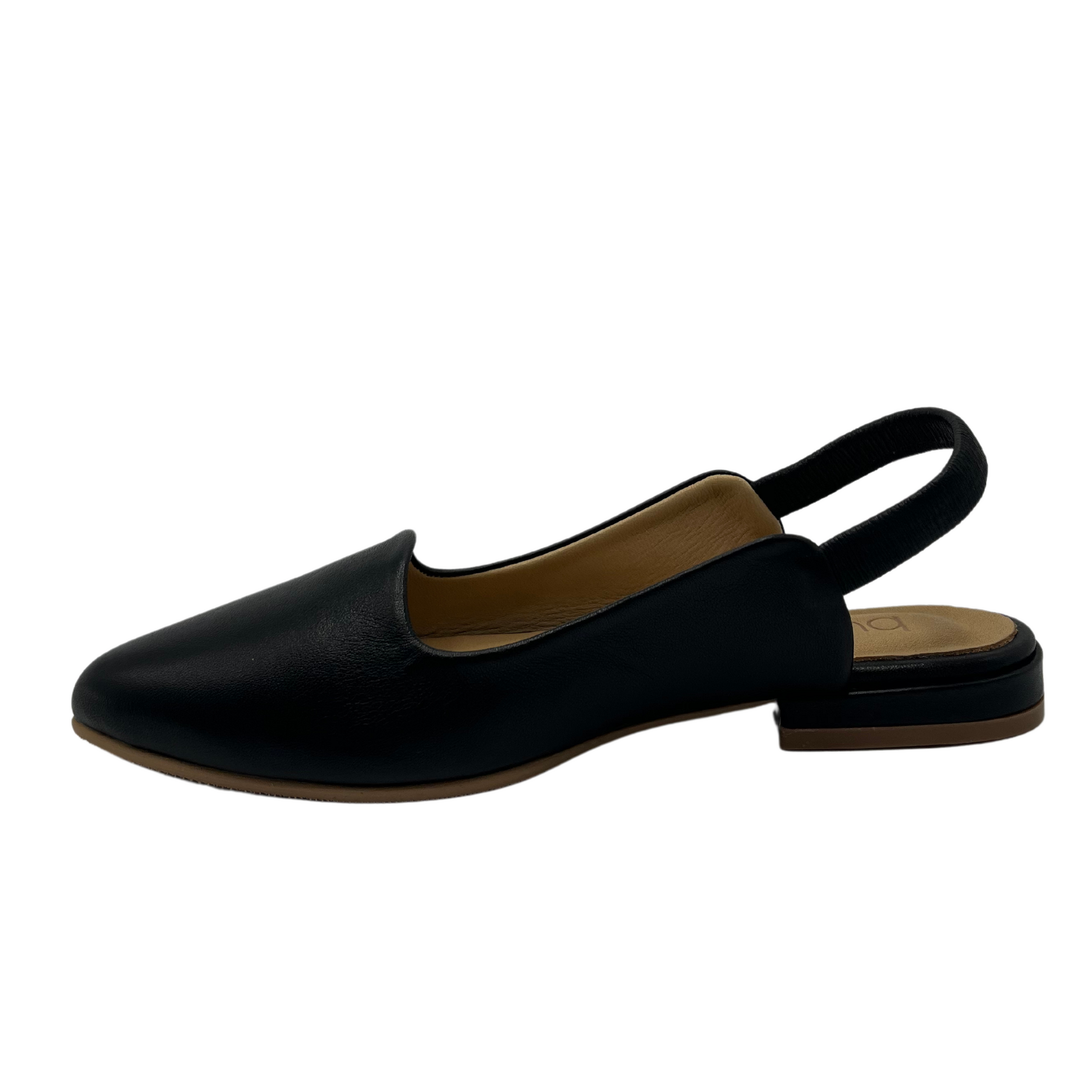Left facing view of black leather flat shoe with pointed toe and slingback strap