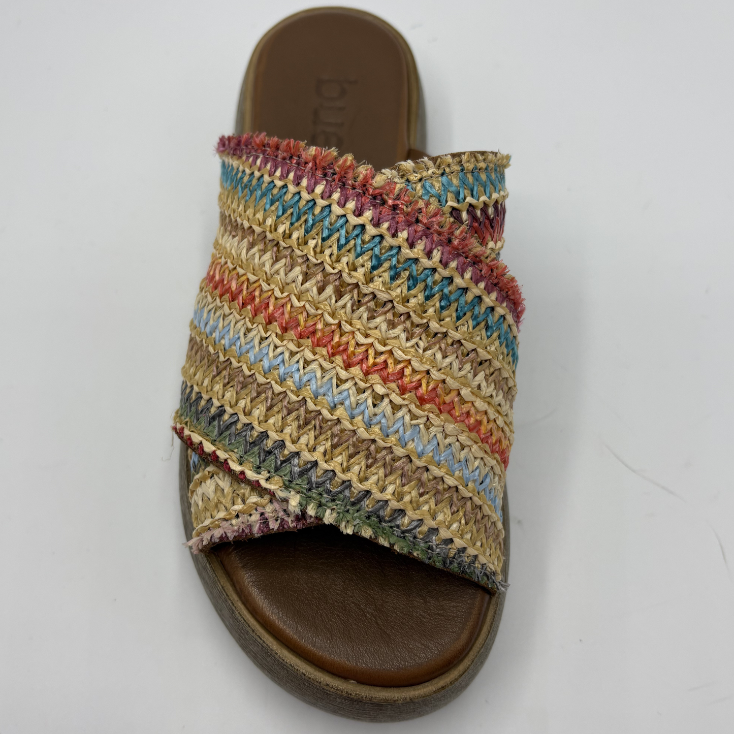 Multicolored woven sandal on a white background