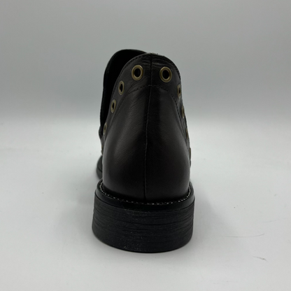 Brown leather shoe on a white background