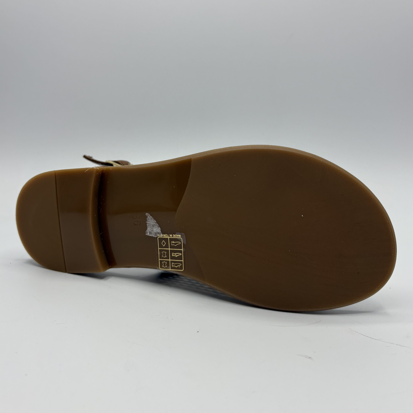 Brown sandal sole on a white background