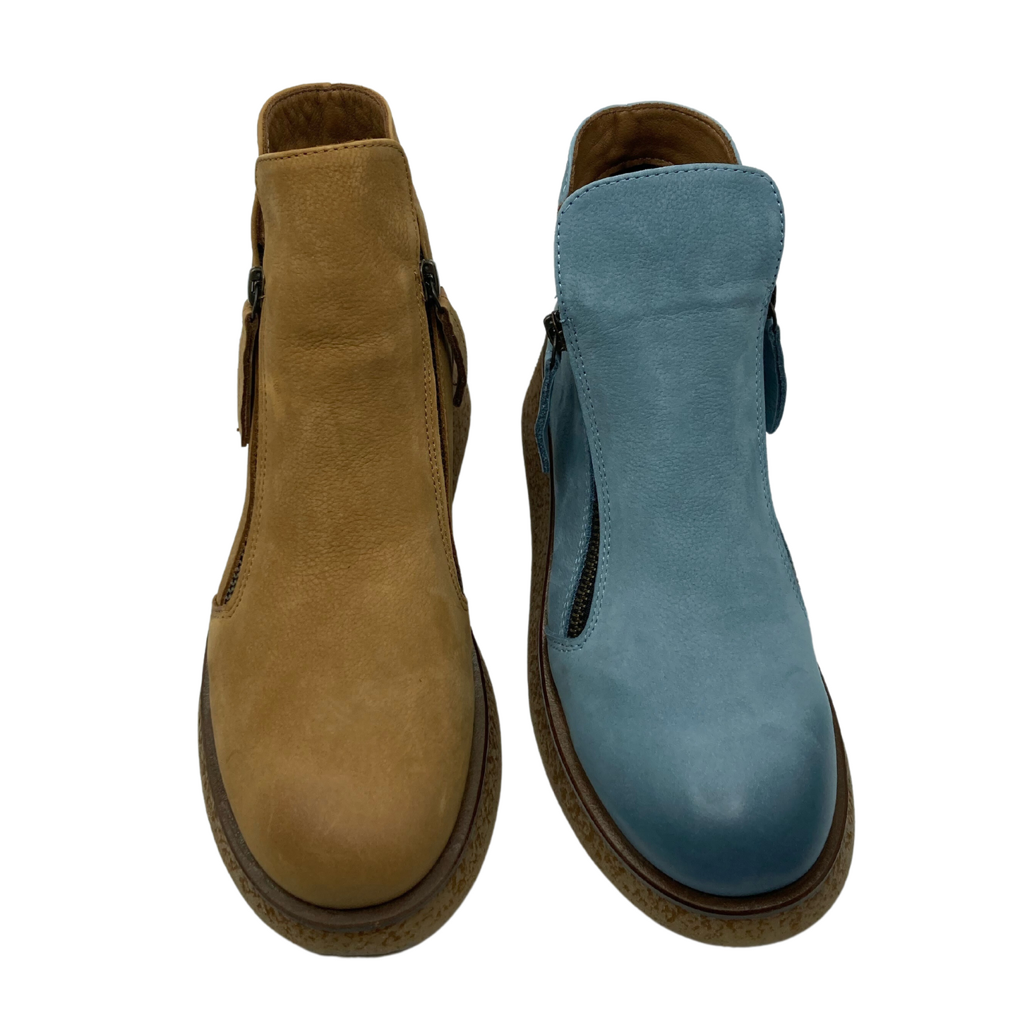 Top view of two short boots. The left one is light brown and the right one is sky blue. Both have double side zipper closures and rounded toes