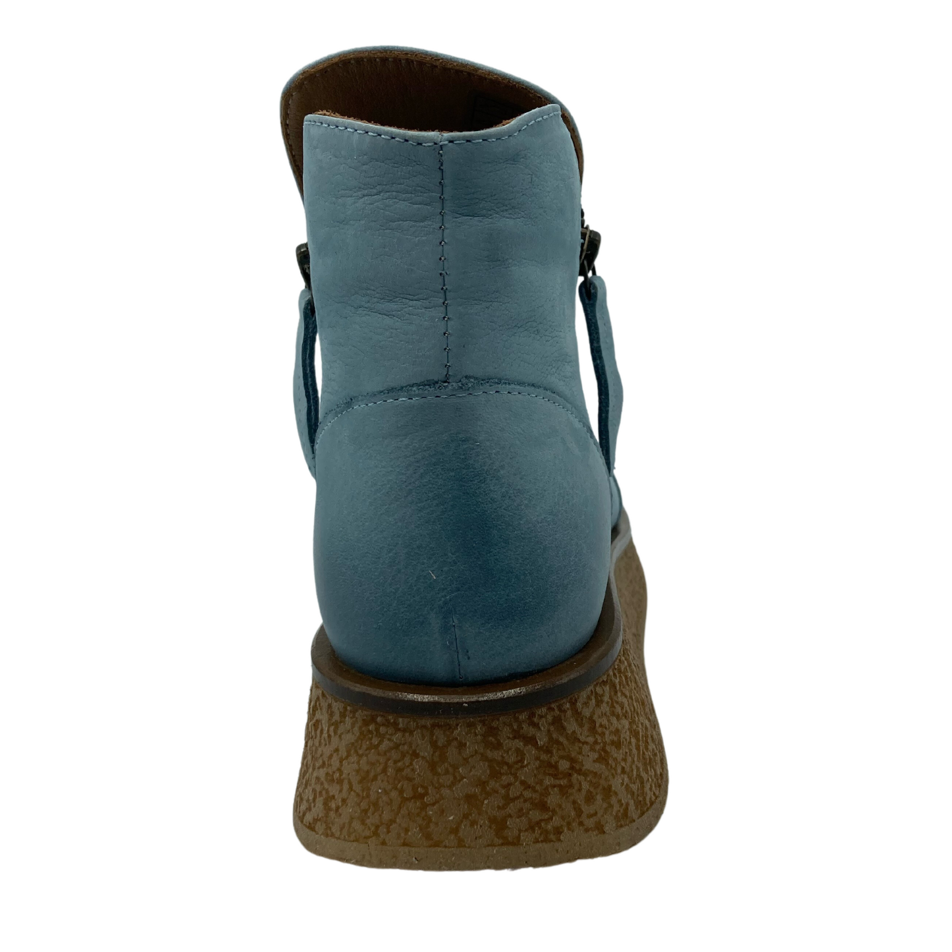 Back view of sky blue ankle boot with platform outsole