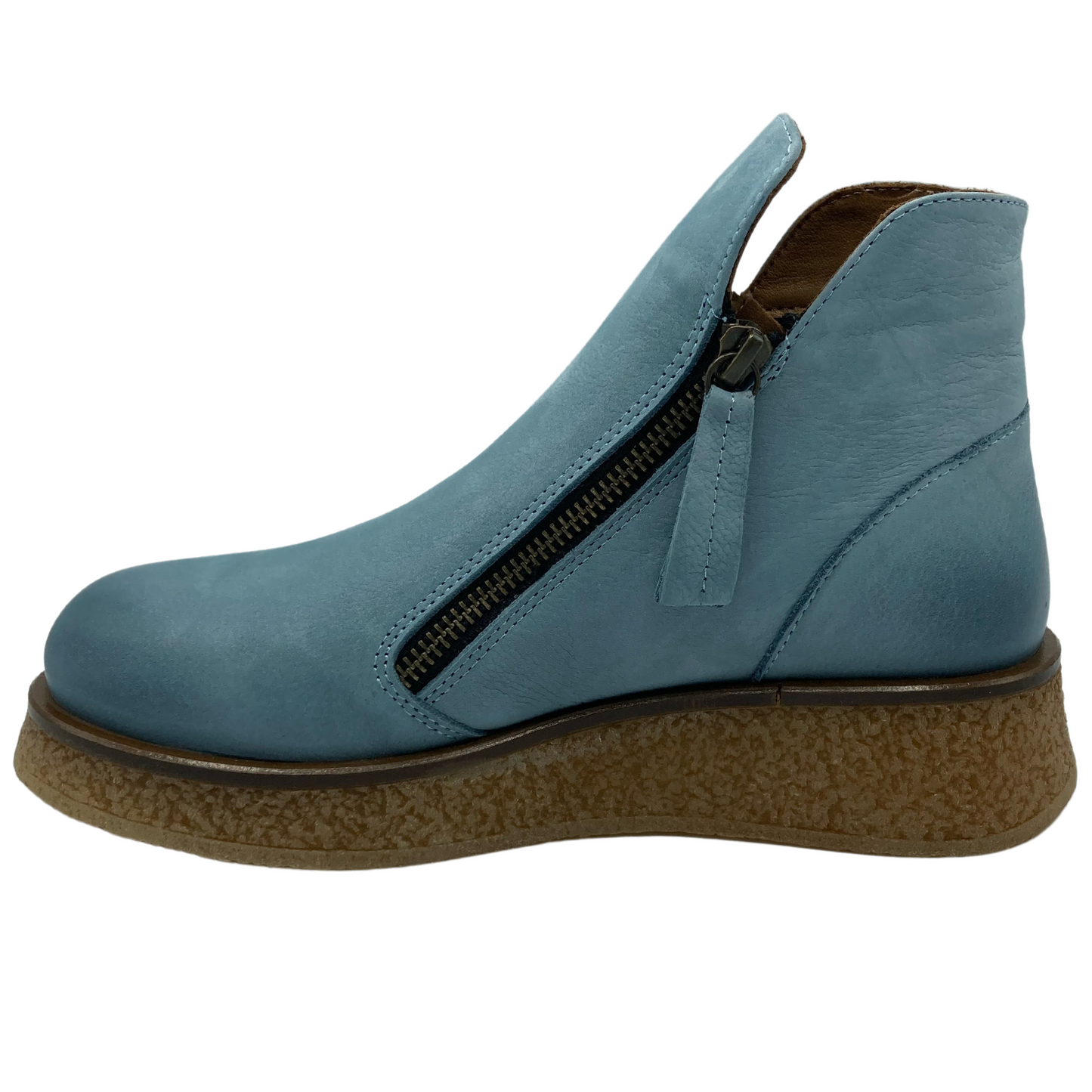 Left facing view of sky blue ankle boot with double zipper closure and platform outsole