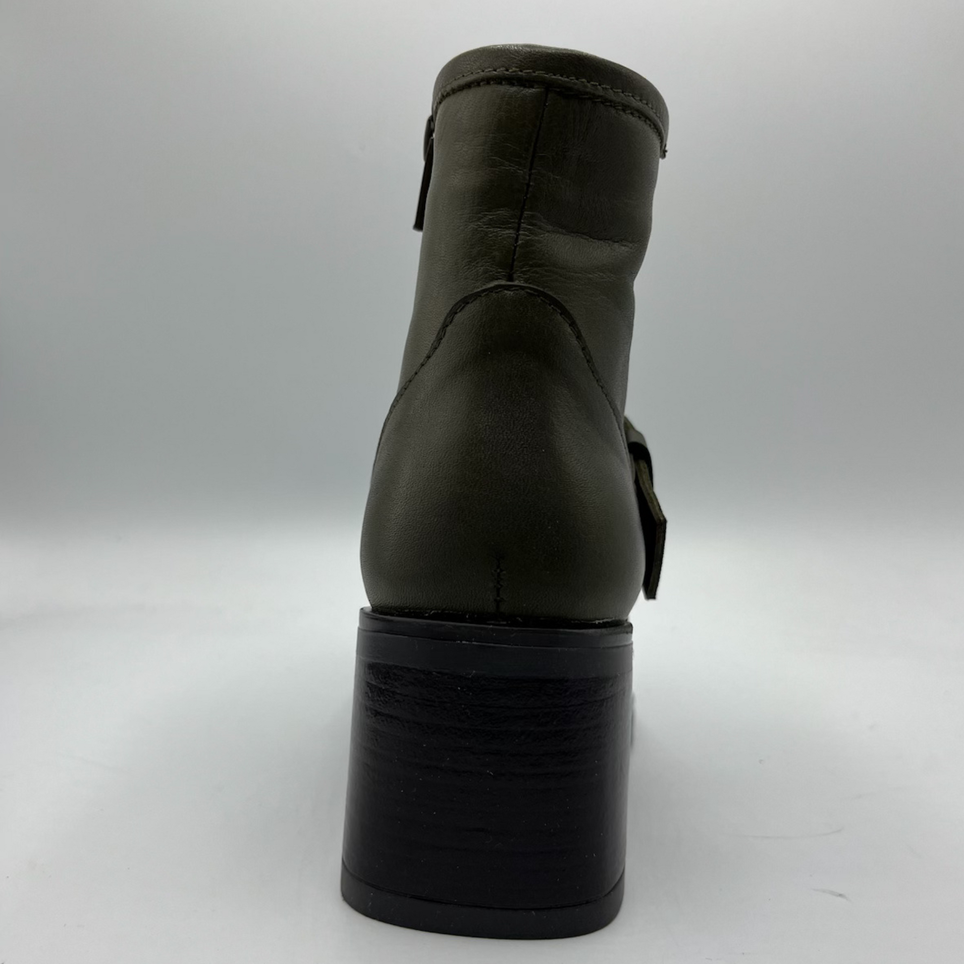 Black ankle boot on a white background