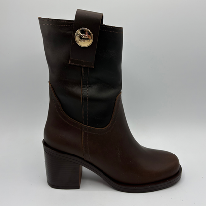 Right facing view of a brown leather short boot with a stacked heel and gold button accent