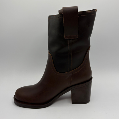 Left facing view of a brown leather short boot with a stacked heel and gold button accent