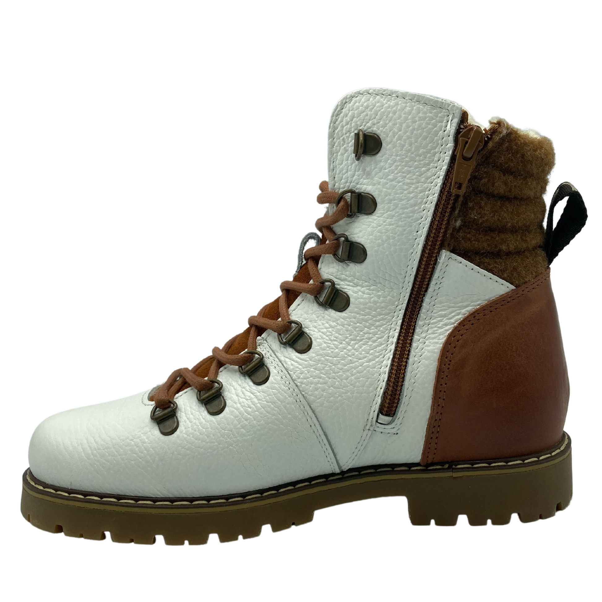 Left facing view of white leather boot with wool ankle and side zipper closure