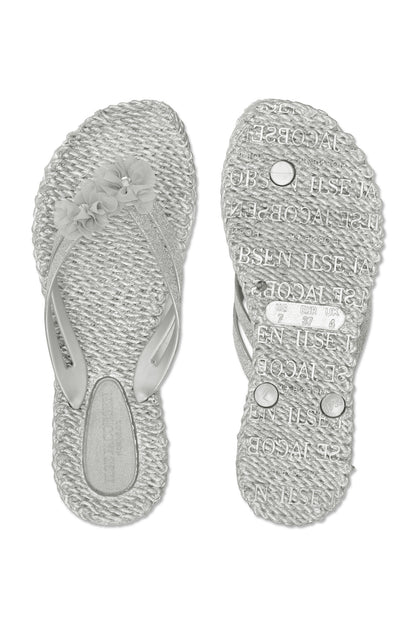 Silver flip flops with pretty synthetic flowers in matching colour. Cheerful 18F Waterlilyshoes.com