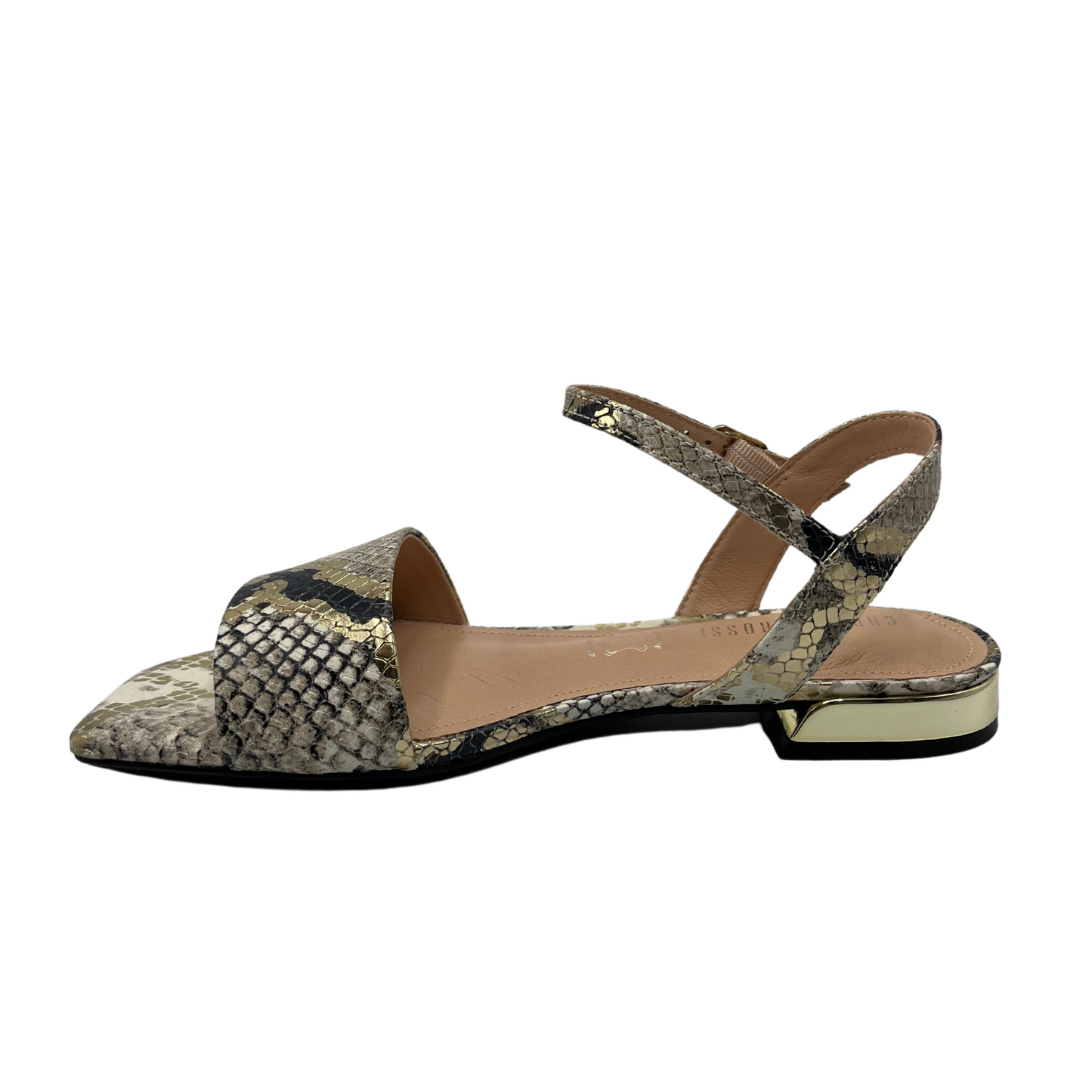 Left facing view of flat snake skin design leather sandal with square toe and gold detail on heel