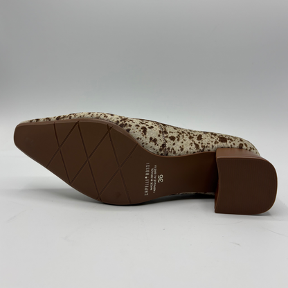 A single women's pointed-toe heeled shoe shown from the side, revealing a brown textured sole and heel with a beige and brown speckled upper, on a light gray studio background.