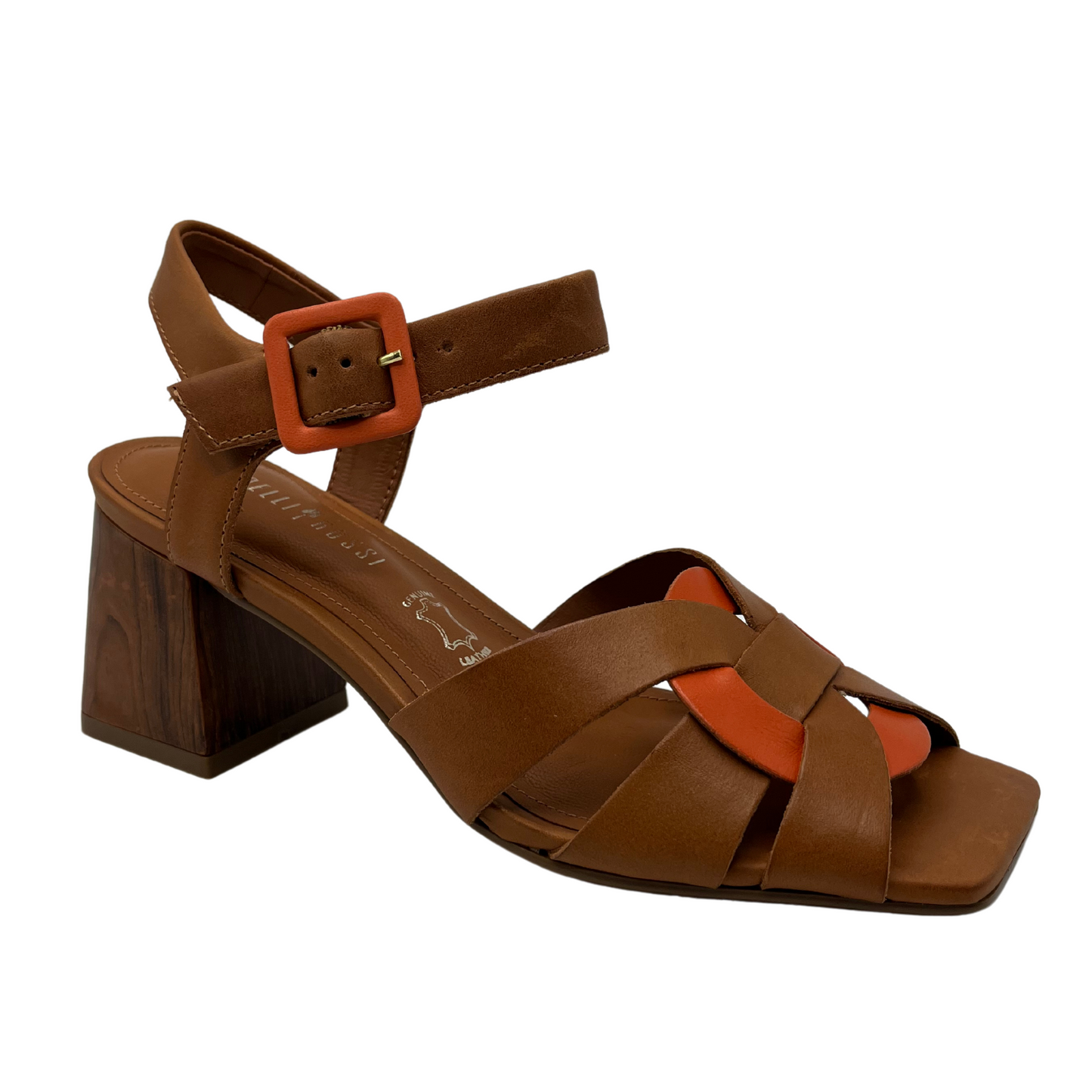 45 degree angled view of brown leather sandal with square toe and block heel. Orange leather details on strap and toe