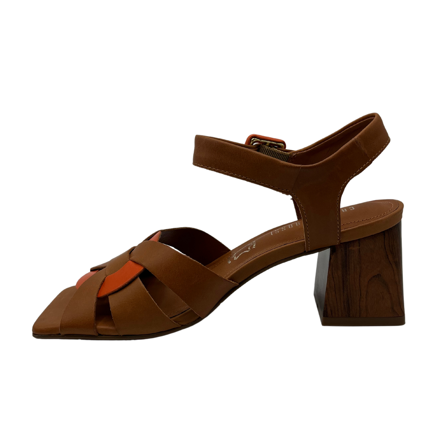 Left facing view of brown leather sandal with square toe and block heel. Orange leather details on strap and toe