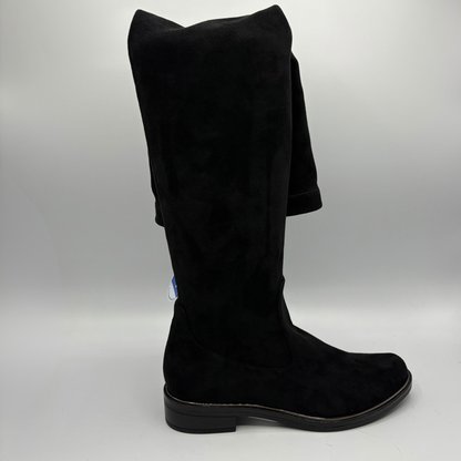 Right facing view of a tall black boot