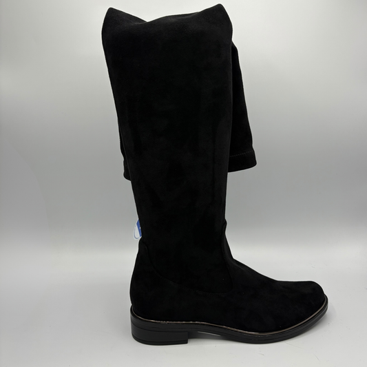 Right facing view of a tall black boot