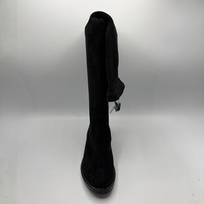 Front view of a tall black boot on a white background