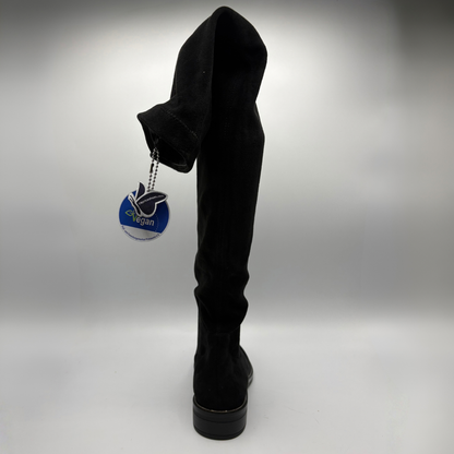 Back view of a black tall boot on a white background