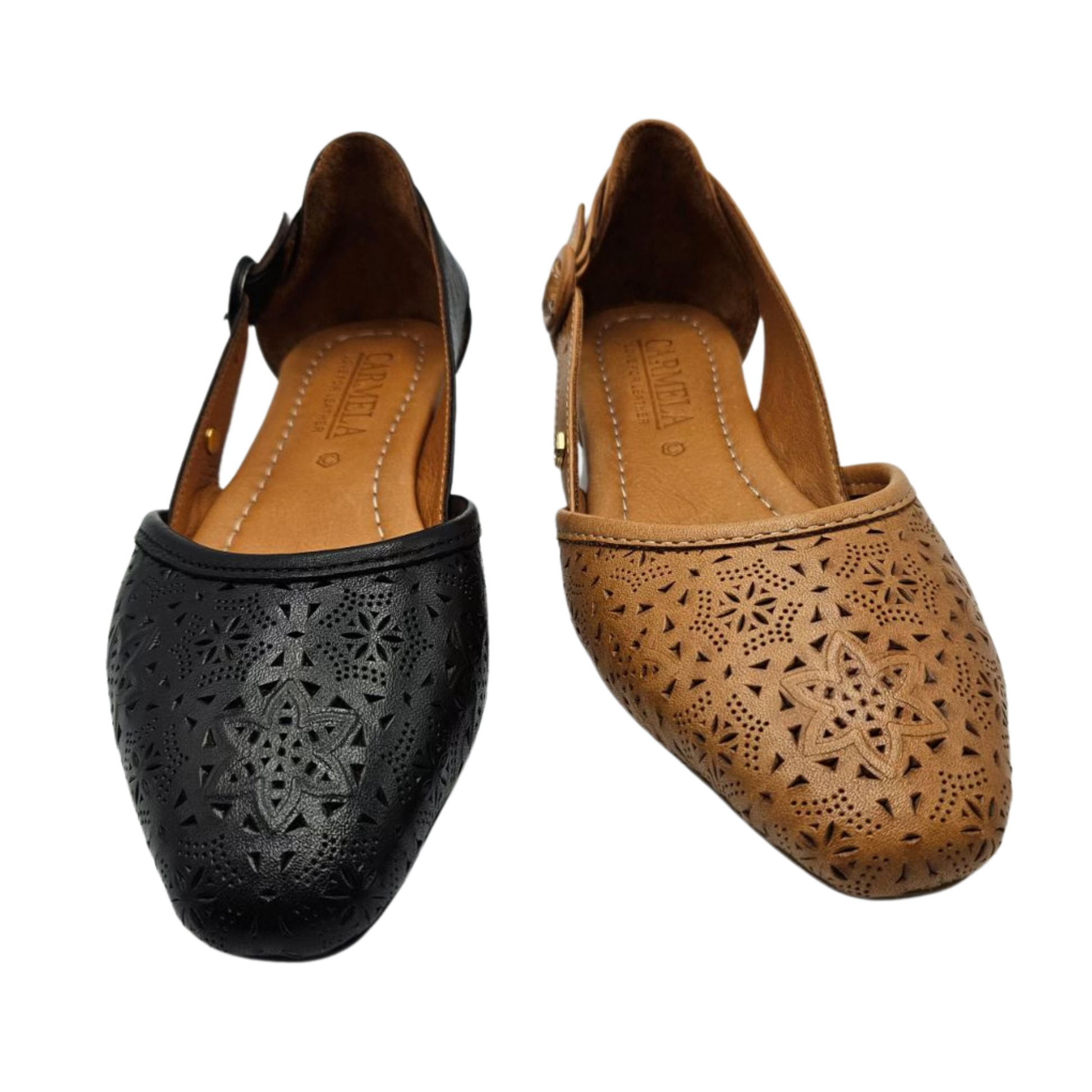 Front view of two flat shoes side by side. The left one is black and the right one is tan. Both have perforated floral designs on the front and adjustable side buckle straps. Slightly pointed toe and leather lined.