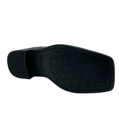 Bottom view of square toed loafer with black rubber outsole