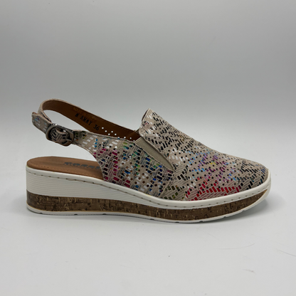 Multicolored shoe with a platform sole on a white background