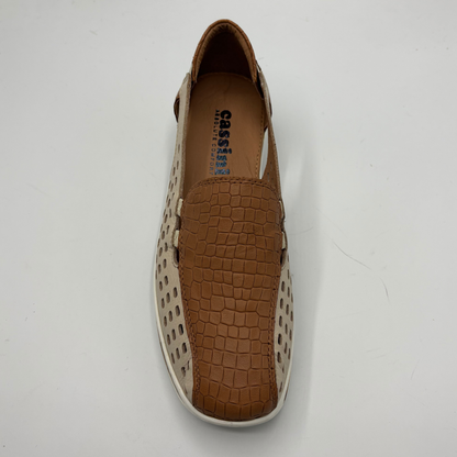 Brown and beige shoe with crocodile texture on a white background