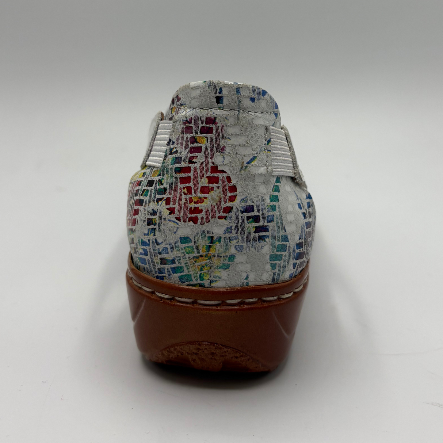Multicolored patterned shoe on a white background