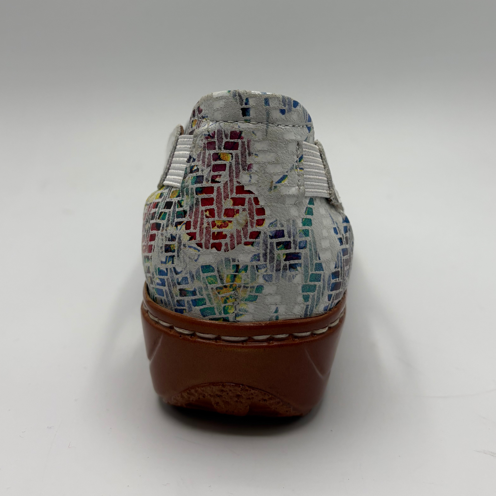 Multicolored patterned shoe on a white background