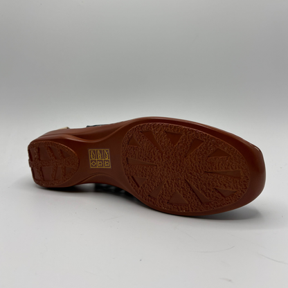 Brown shoe sole with brand logo on a white background