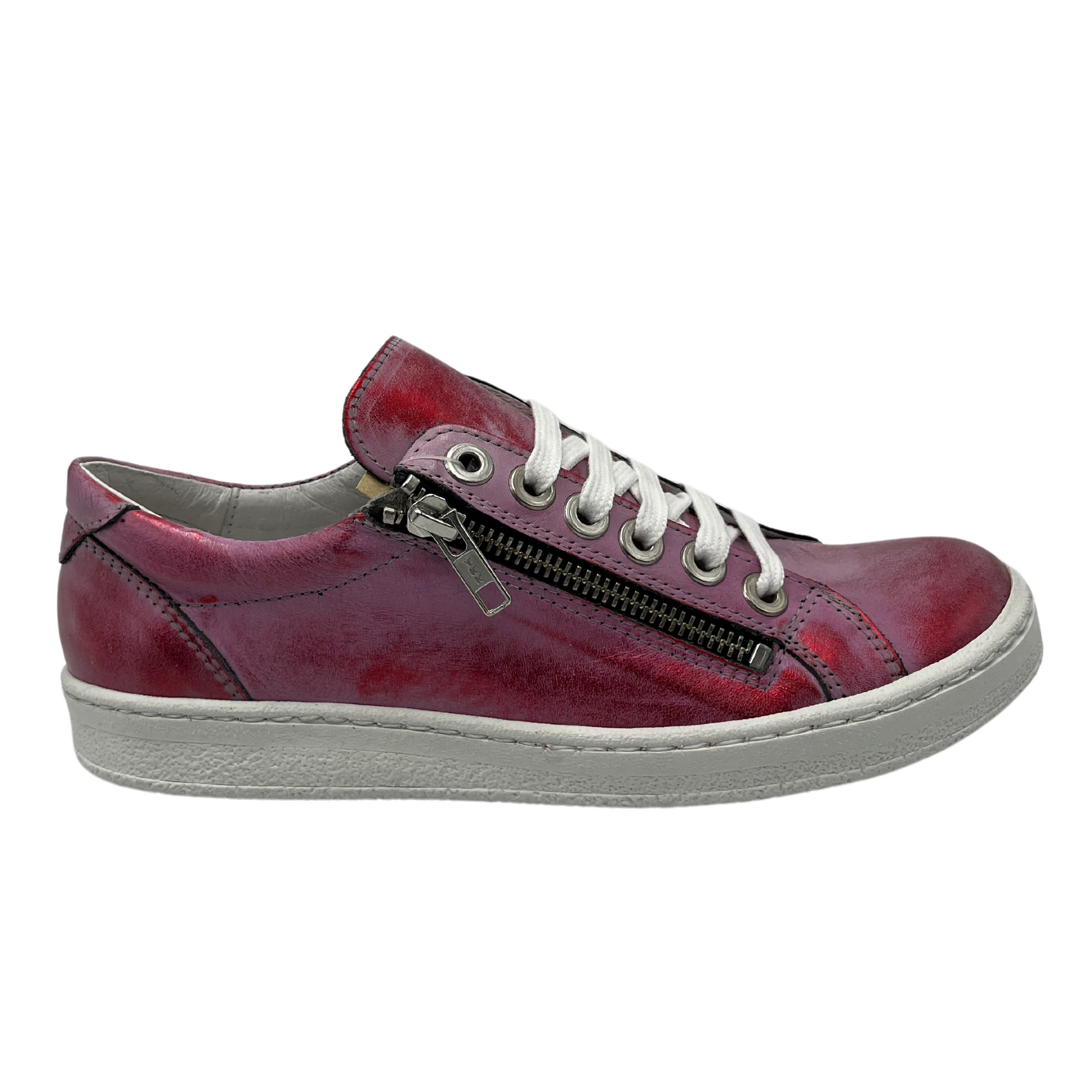 Right facing view of metallic red leather sneaker with side zipper closure and white laces