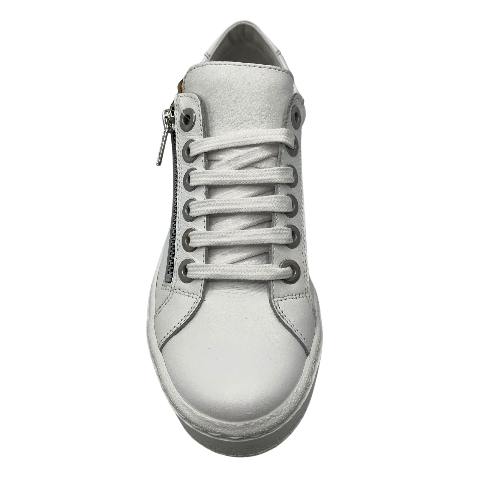 Top view of white leather sneaker with matching laces and side zipper closure
