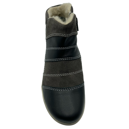Top view of brown patchwork leather ankle boot with wool lining and rounded toe