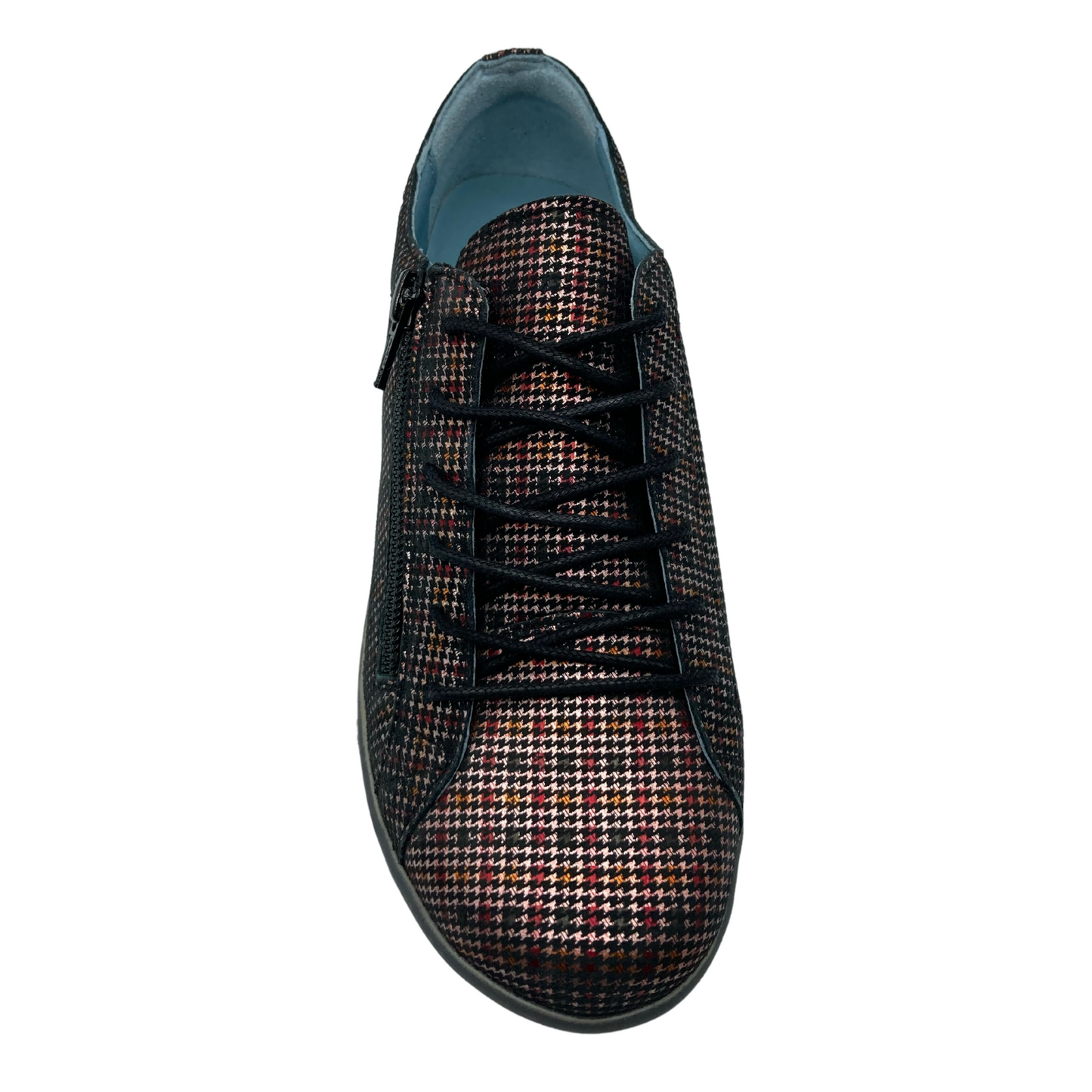 Top view of leather sneaker with black laces, rounded toe and blue lining