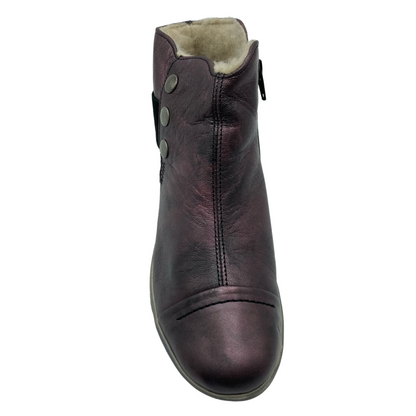 Top view of leather ankle bootie with wool inner lining and cap toe