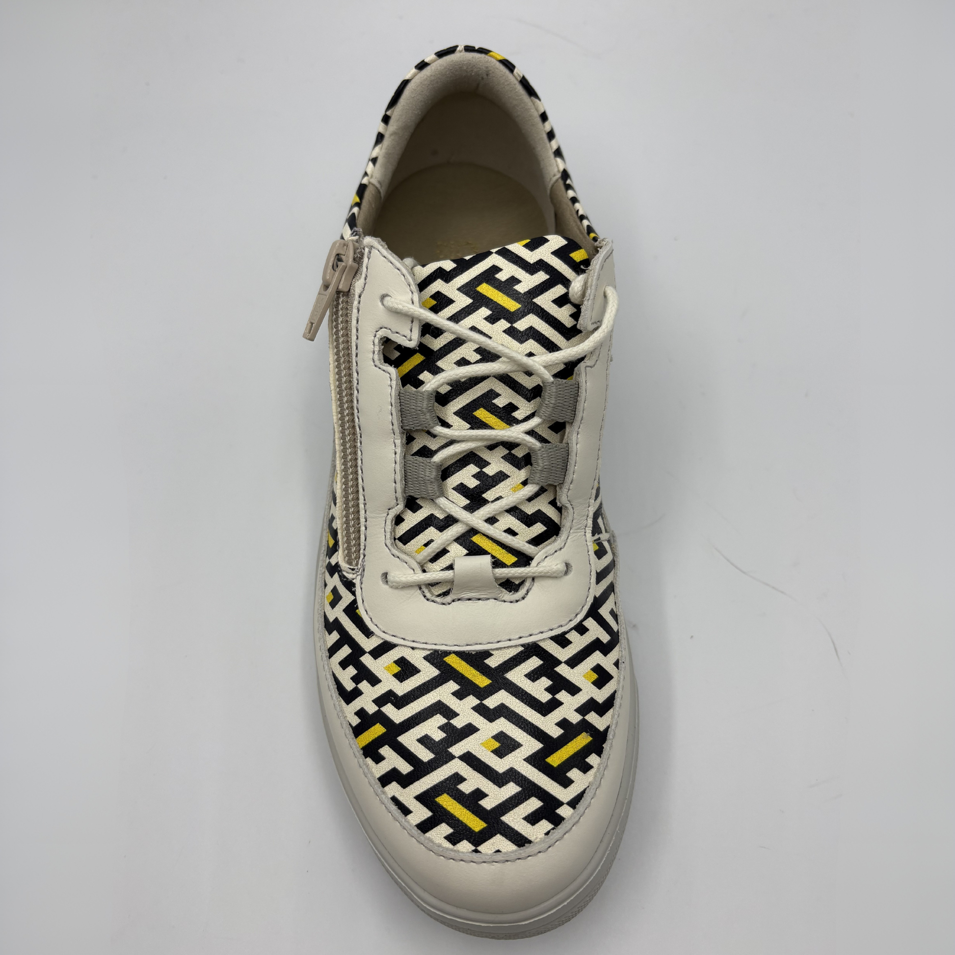 Sneaker with geometric pattern on a white background
