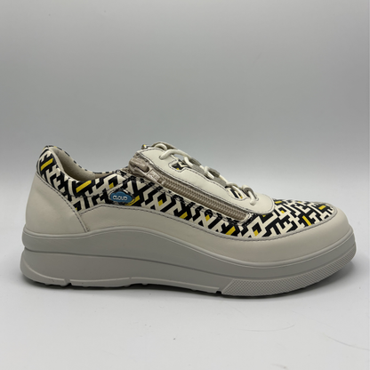 Sneaker with geometric pattern on a gray background