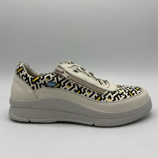 Sneaker with geometric pattern on a gray background