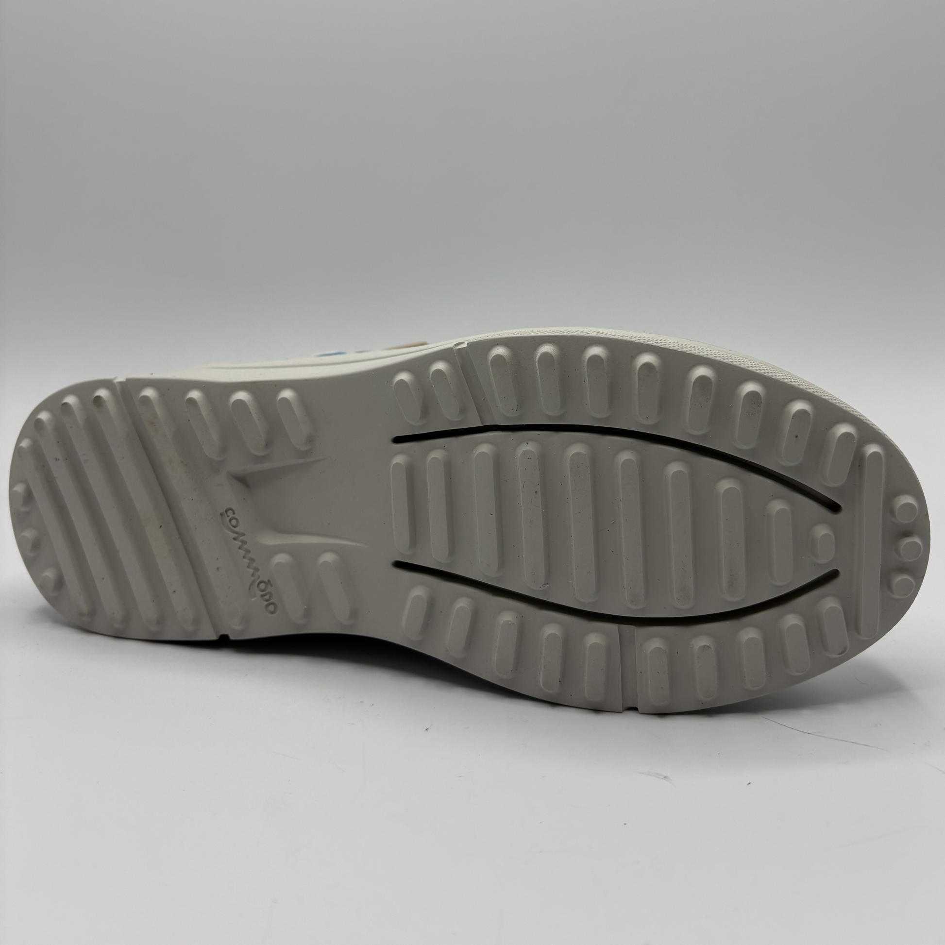 Gray sole of a shoe on a white background