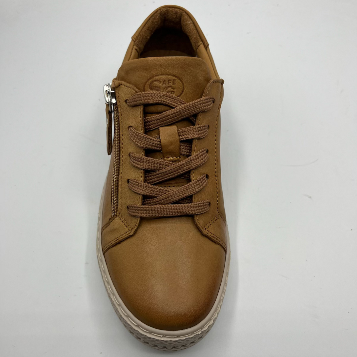 Top view of a brown leather sneaker with laces and a side zipper closure
