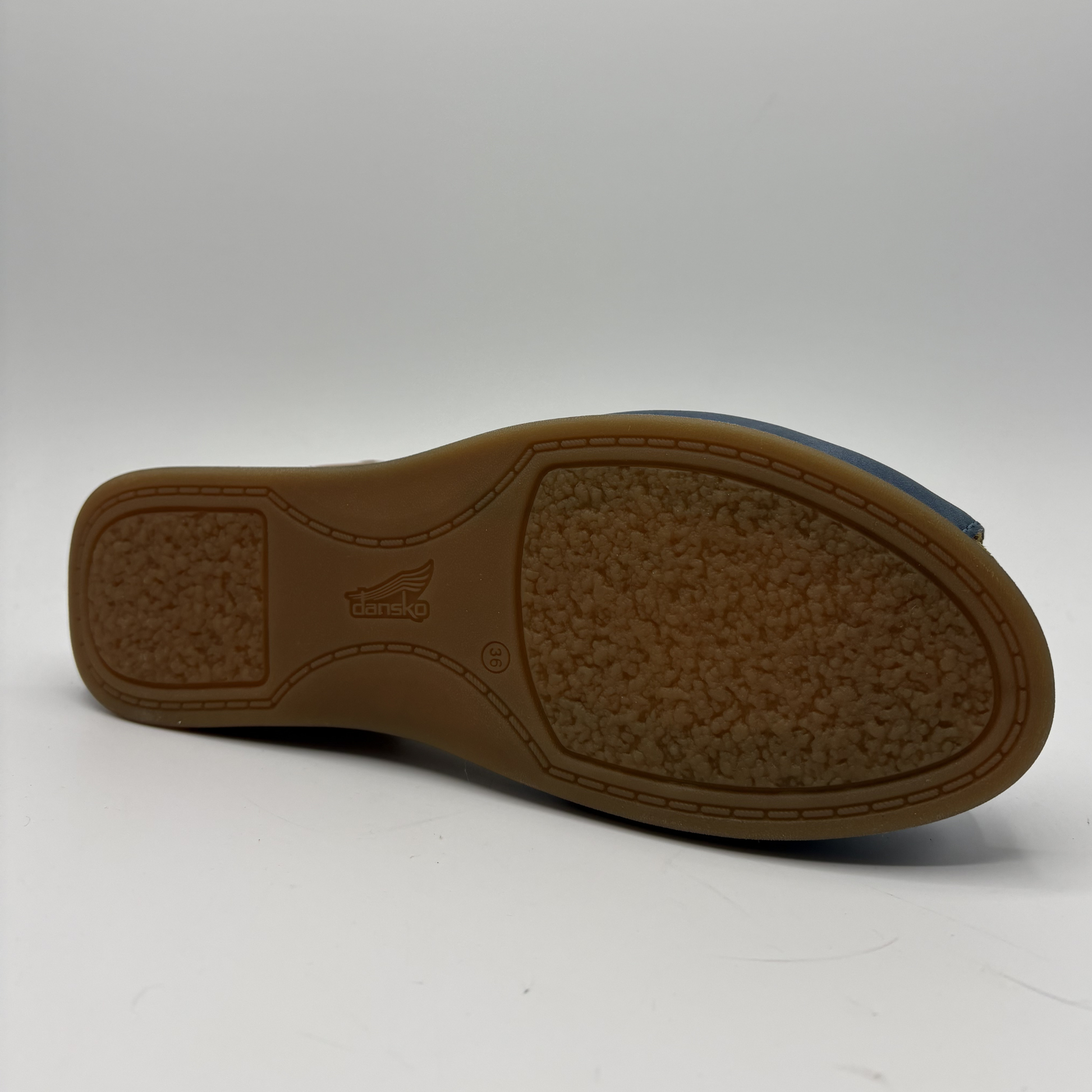 Brown shoe sole on a white background