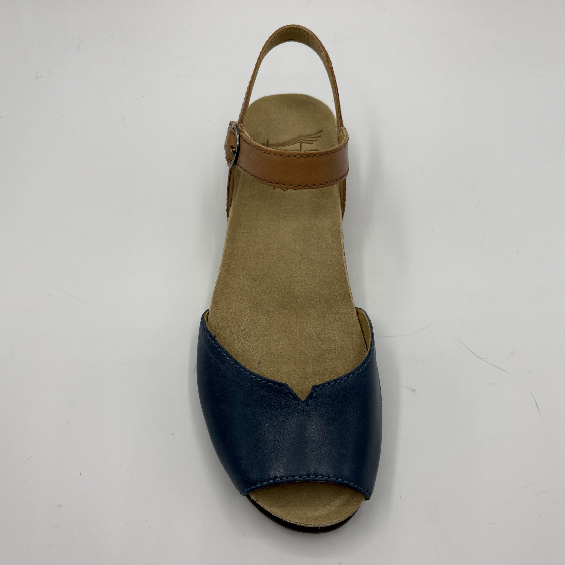 Blue sandal with brown strap on a white background