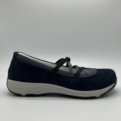 Navy blue shoe with gray sole on a light gray background