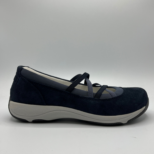 Navy blue shoe with gray sole on a light gray background