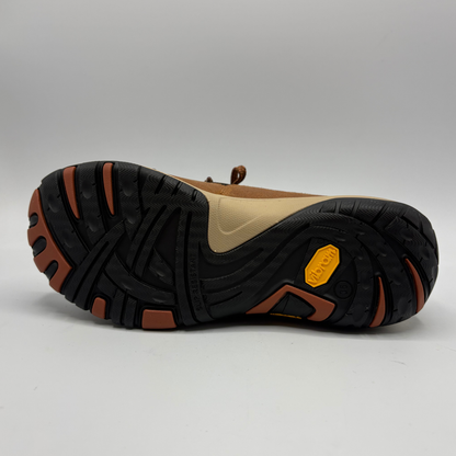 A brown low-top sneaker with a leopard-print pattern panel, black toe cap and outsole, and a beige midsole, shown from the bottom on a white background.